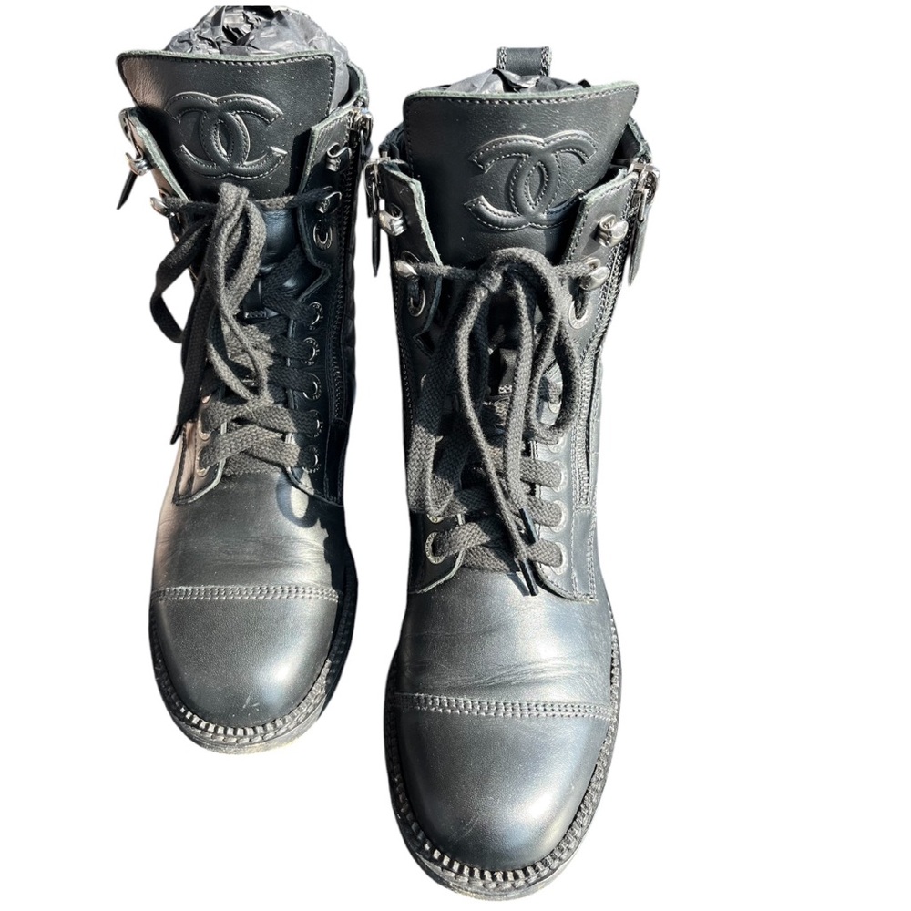 100% authentic Chanel combat boots size 35. Fits like 5.5 know your Chanel size